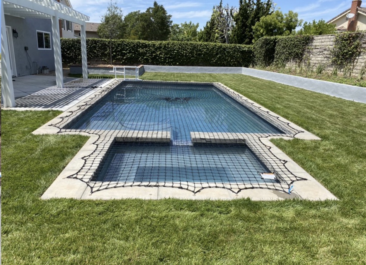 Rectangular pool with custom safety net