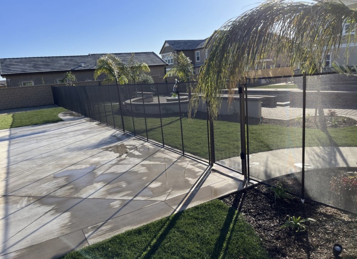 Long mesh safety fence across patio