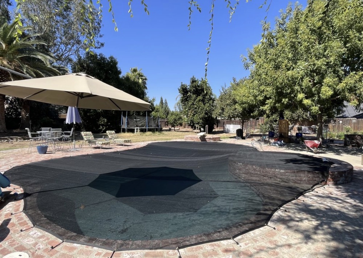 Large pool with winter safety cover